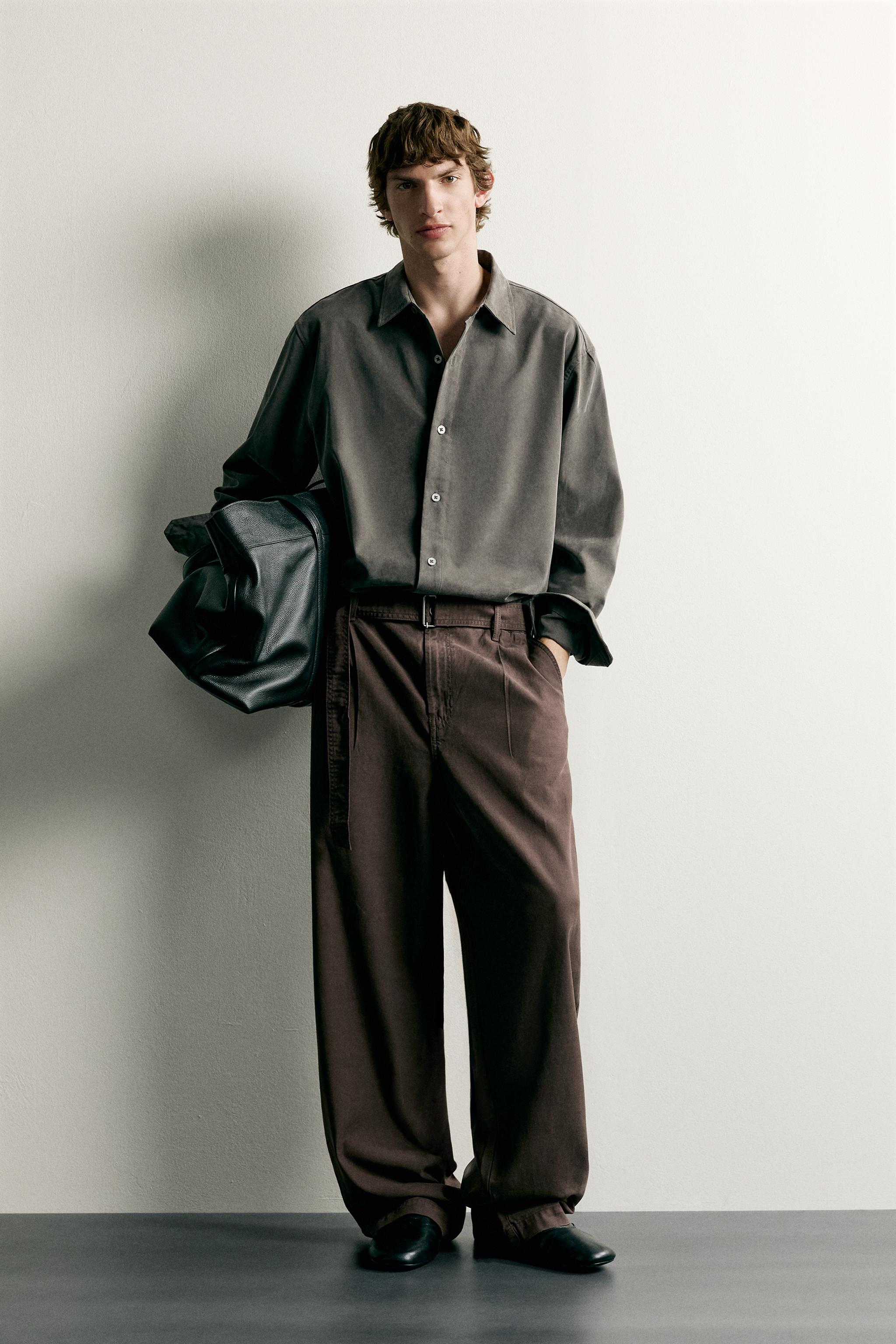 RELAXED FIT BELTED PLEATED PANTS